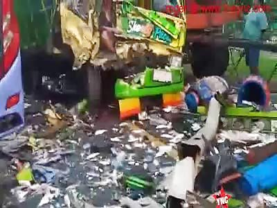 man in his pick up was crushed by a bus on the island of Sumatra