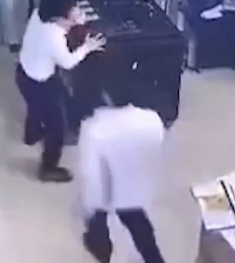 Scumbag Punches Female Security Guard in Vietnam