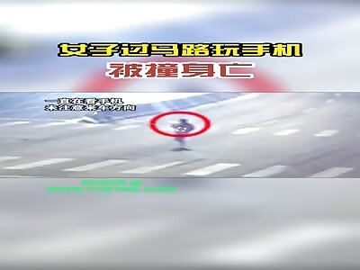 Woman dies on the zebra crossing due to looking at her phone and not the road in Zhejiang