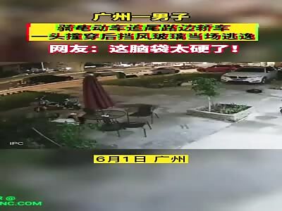 Man on his bike crashed his head into a BMW rear windshield in Guangdong