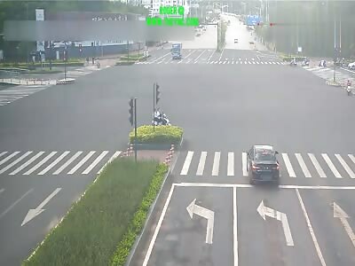 Two on a two-wheeled electric vehicle was hit by a car in  Guizhou