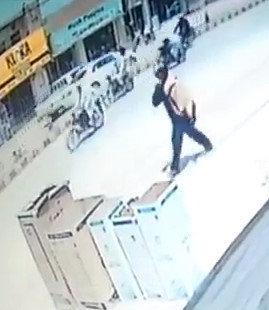 A Police officer on his motorcycle is gunned down