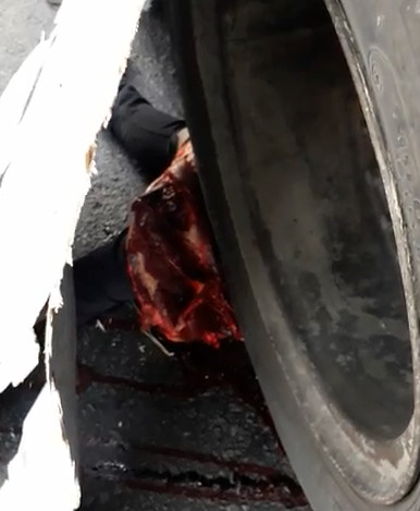 Man Totally Crushed by Truck