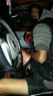 Four Men in Car Ambushed and Riddled with Bullets