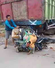 Motorcyclist Rams Parked Truck, Dies Embedded In It