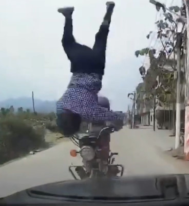 Motorcycle Crashes Into Car