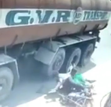 Rider Falls Under Truck Head-First