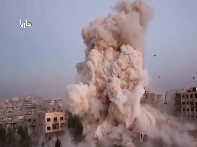Alleged Syrian Regime Barrel Bombing Levels Entire City Block