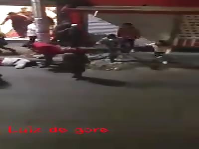 men on a motorcycle shoot at an establishment