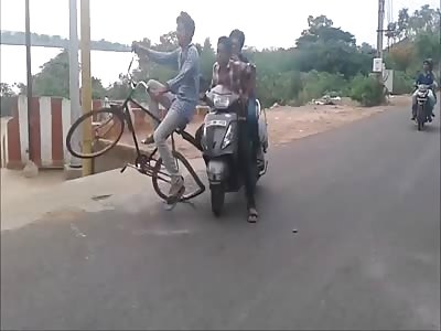 Scooter Crashes Into Cyclist.