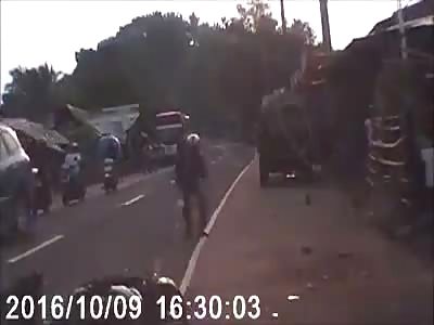 Jumps off bike to avoid death.