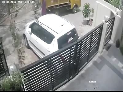 Woman ran over and killed by reversing truck.