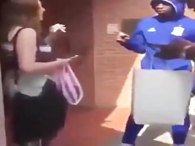 Black bloke abusing white girl.