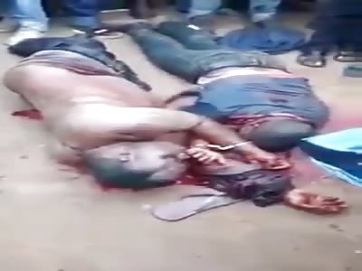 2  handcuffed Thieves being beaten while agonizes