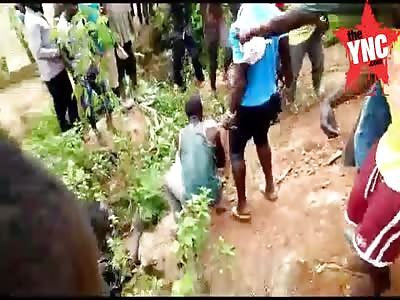 Man being brutally lynched