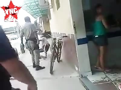 Policeman punches an old man