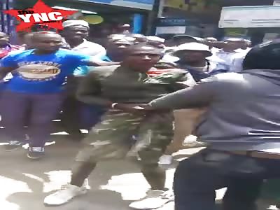 Thief is brutally beaten by mob