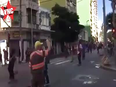 Car drives into dozens of skateboarders