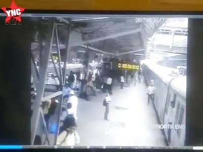 Woman jumps in front of a train