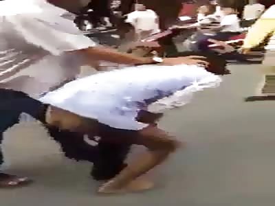 Thief loses his pants as he is beaten