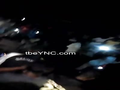 Thug is beaten with sticks