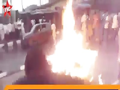 Thug is beaten with stones, doused in gasoline and burned alive