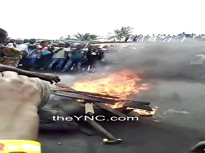 Woman burned to death by angry mob