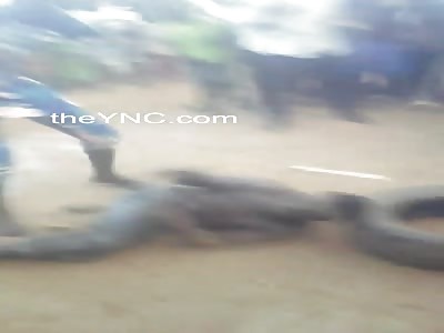 Thug caught and beaten by mob