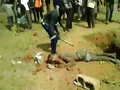 Thug beaten with sticks and brutally killed with rocks to the head.