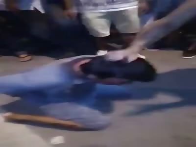 Thief Gets Kicked and Beaten Before Cops Drag Him Away