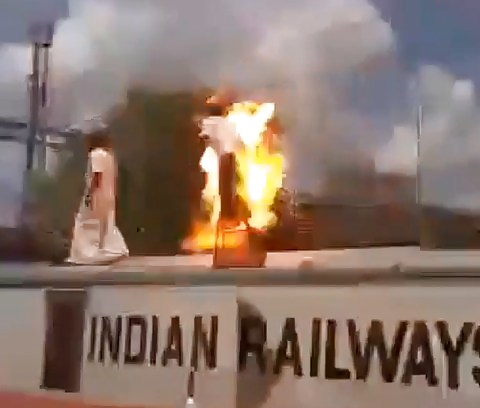 Indian Man Gets Zapped Like A Bug on Top of Train (3 Angles)