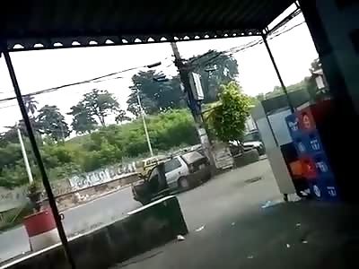 Brazilian Woman Gets Shot While Filming a Gunfight