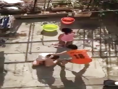 Man Thrashes Wife With Metal Stick in Front of Daughter