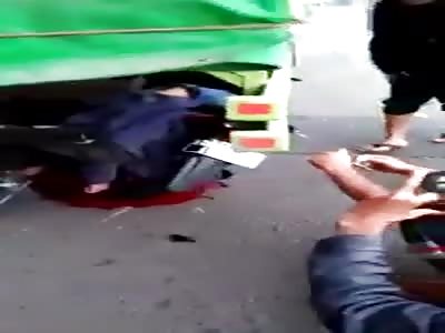 Biker Crushed Under Truck in Indonesia