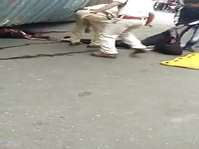 Dead Woman Pulled from Under the Bus