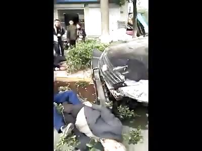 Car Crashes into Spectators