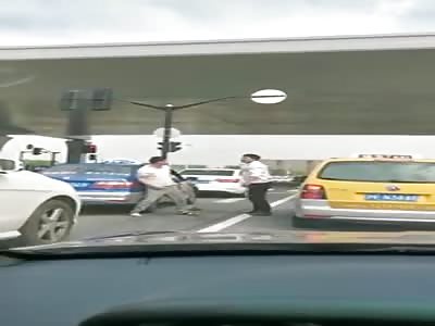 Passenger Fights With Taxi Driver