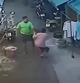 Big Dude in Green Beats His Wife Like a Ragdoll