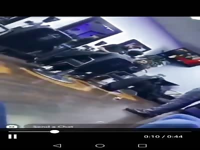 guy gets knocked out in barber's shop in  Birmingham