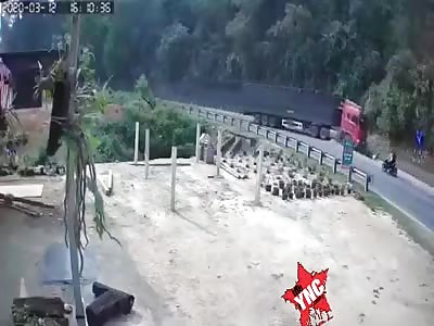 Motorcyclist hit by large truck