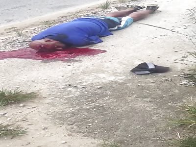 Man in agony after being shot in the head