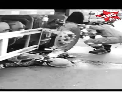 Motorcyclist crushed by truck