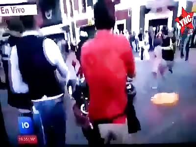 police is burned by protester