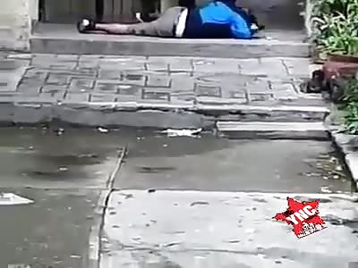 the man is subdued by the police, a blow to the head