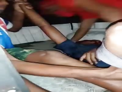 young man in agony, after being shot