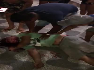 man in agony after being shot several times