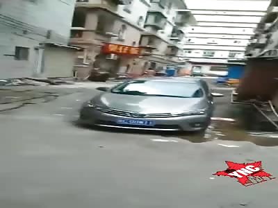 Men lie bleeding in the street after attack.