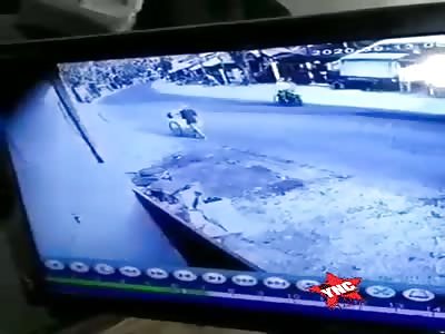 Cctv, street vendor is run over by truck.