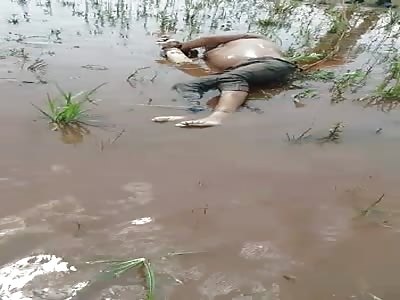 Body found with hands bound on the water's edge.