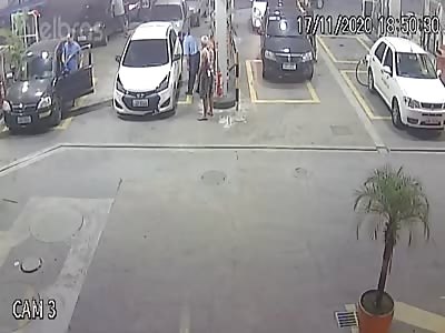 Man gets shot in gas station fight.